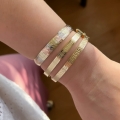 Złota sztywna bransoletka z greckim wzorem 6 mm próby 585