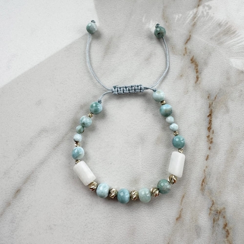 Złota bransoletka larimar 11 kulek próby 585