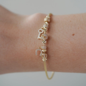 Złota bransoletka Aurora Charms – z zawieszkami i detalem, próba 585