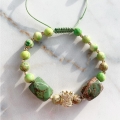 Złota bransoletka handmade z jaspisem i koroną - 585