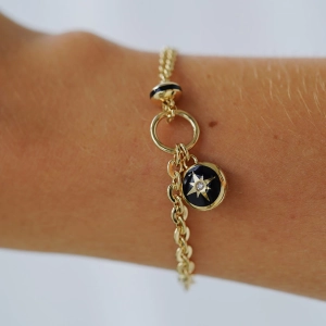 Złota bransoletka 585 róża wiatrów z emalią North Star