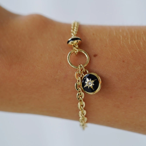 Złota bransoletka 585 róża wiatrów z emalią North Star