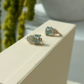 Złote kolczyki Royal Sky Blue z topazami i diamentami próby 585